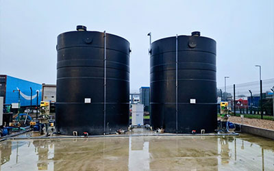 photo of two plastic water tanks Niplast made for ogden water